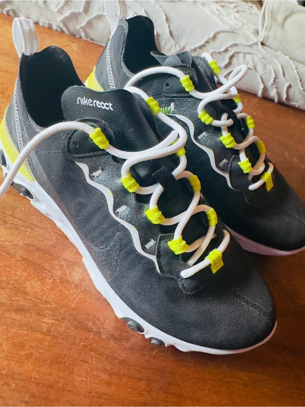 Nike Black Sneakers with Neon Yellow Accents and White Laces